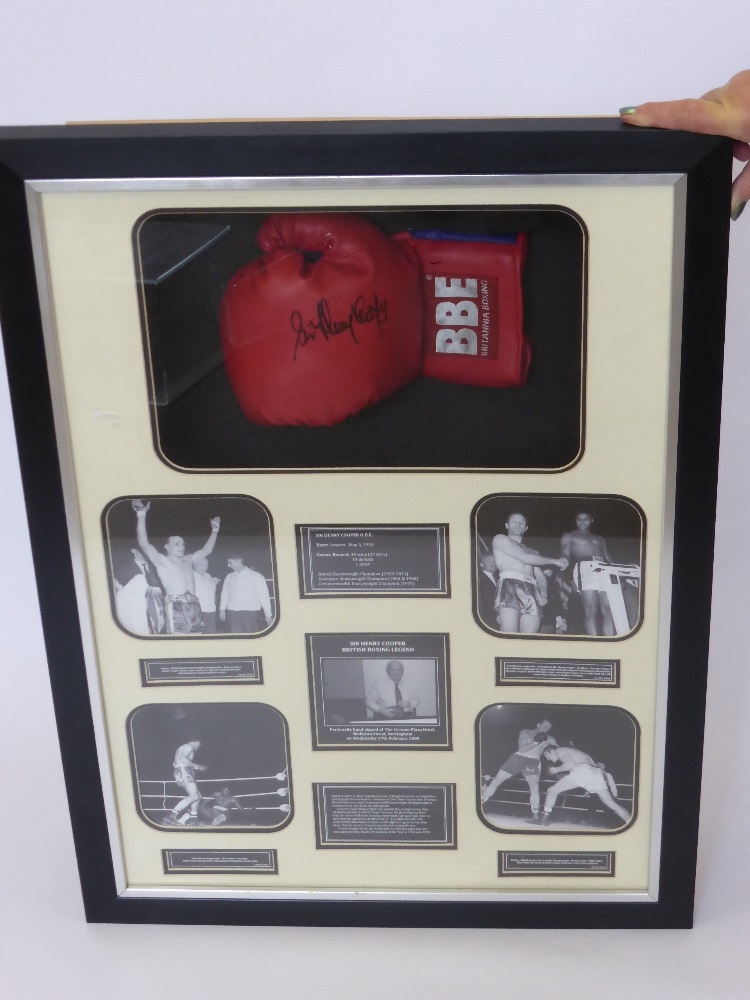 A Box Frame with Perspex Covering depicting five photographs of Sir Henry Cooper O.B.E., British