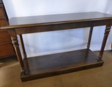 An Oka Mahogany Console Table, on turned legs, with platform base, approx 140 x 49 x 86 cms