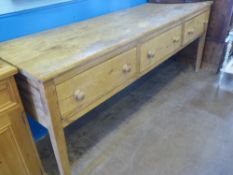 A Traditional Antique Pine Dresser Base, three drawers on straight legs, approx 230 x 62 x 90 cms