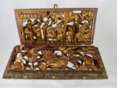 Two Chinese Three Dimensional Wood Carved Decorative Panels, depicting figures in a garden and