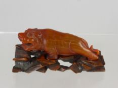 An Antique Chinese Figure of a Tiger.