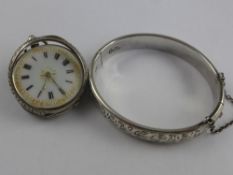 A Lady's Solid Silver Bracelet together with a continental silver lady's pocket watch. (2)