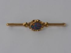 A Lady's Edwardian 9 ct Gold and Opal Stick Pin, together with 9 ct gold and pearl stock pin. (2)