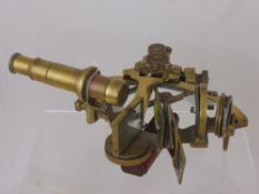 A Vintage Brass Elliott Brothers London Sextant, with brass scale, magnifier and coloured glass