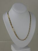 A Lady's 14 ct Trigold Bracelet and Necklace, the necklace approx length 39 cms,  wt 13 gms.