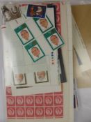 An Envelope of GB Stamps, mint and on commemorative cover.