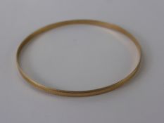 A Lady's 9 ct Gold Bangle, approx 4.4 gms.