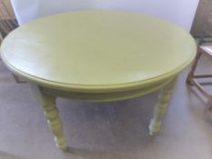 A Circular Cream-Painted Pine Table, approx 135 dia x 78 cms h, retailer Mulberry Pine, Suffolk