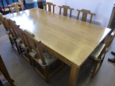 A Japanese Reclaimed Timber Dining Table, together with eight solid wood chairs with detachable