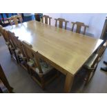 A Japanese Reclaimed Timber Dining Table, together with eight solid wood chairs with detachable