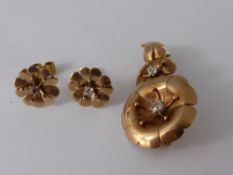An Antique 9 ct Rose Gold and Diamond Flower Brooch and Earrings, approx wt 5.6 gms, the brooch