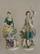 A Pair of Circa 19th Century Samson Figurines, depicting a shepherdess playing a tambourine and a