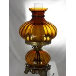 An Amber Glass Oil Lamp, wired for conversion.