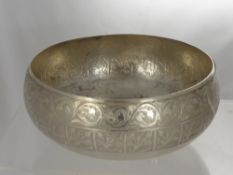 A Malay Silver Serving Bowl with four smaller rice bowls, the bowls with flowering plant (air