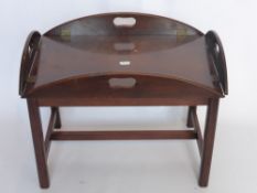 A Mahogany Brass Hinge Butler's Tray, on stand, tray measures approx 74 x 48 x 12 cms.