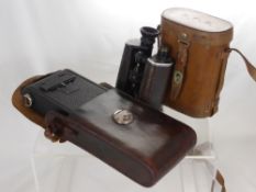 A "Trieder Binoculars Army" Binoculars in case initialled L.M.C. together with a  vintage Kodak