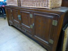 A Circa 1900 Chinese Fruit Wood Sideboard, the sideboard having cupboards to either side with