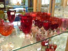 A Quantity of Cranberry Glass, including a hock glass, six sherry glasses, two liqueur glasses,