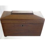 A Georgian Mahogany Tea Caddy in the form of a casket on bun feet, together with a mahogany