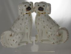 A Pair of Large Staffordshire Dogs.