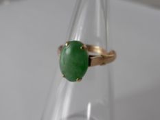 A Lady's 14k Yellow Gold Jade Ring, size O, approx wt 2.9 gms.