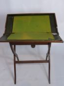 An Antique Oak Campaign Desk, the desk having original leather top with felt blotters, approx 61 x