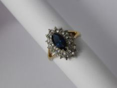A 14 Ct Gold Lady's Ring with blue and white stone, size P, approx wt 2.9 gms.