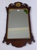 An Antique Mahogany and Gilt Wood Chippendale Style Mirror, having floral fretwork to top and