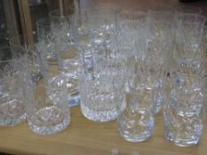 A large quantity of unmarked crystal and glass tumblers, approx 14 pcs.