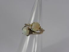 A Lady's 9 ct Gold Hallmark Opal Ring, size I together with a gold metal lady's ring, size I. (2)