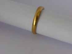 A 22 ct Gold Wedding Ring, size Q, approx wt 4.5 gms.