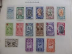 A Crate of All-World Stamps in albums and stockbooks, one in particular containing some