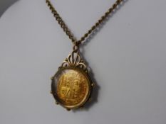 A Victorian Half Sovereign in 9 ct Gold Mount, dd 1887 on base metal chain. .