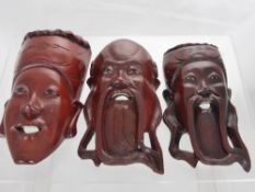 Three Carved Chinese Face Masks, depicting wise men. (3)