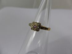 A Lady's 18 ct Hallmark Ruby and Diamond Ring, approx size L, approx 1.4 gms, m.m B & K
