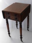 A Victorian Drop Leaf Table with two side drawers on turned supports, approx 48 x 39 x 72 cms,