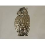 A White Metal Vesta in the form of an owl.