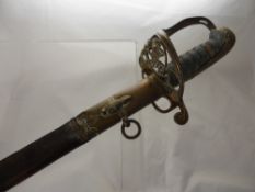 A George V Officer's Dress Sword. The sword having a brass hilt and pommel with chagrin grip and