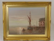 An Oil on Canvas depicting a harbour scene signed W Vennerand, approx 39 x 30 cms.