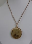 A Lady's Mourning Locket on a 9 ct Gold Hallmark Chain, approx 4.5 gms