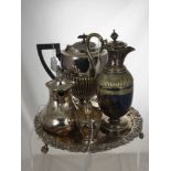 A Quantity of Silver Plate, including two coffee pots, a footed tray, two knife rests, claret jug,