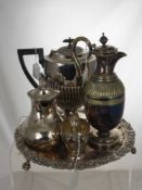 A Quantity of Silver Plate, including two coffee pots, a footed tray, two knife rests, claret jug,