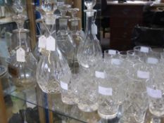 Three Cut Glass Decanters, together with six liqueur glasses, twelve water tumblers, six Bohemian