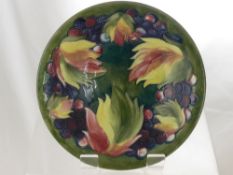 A Moorcroft "Leaf and Berry" Design Pottery Bowl, circa 1950, the bowl having impressed marks to