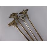 Four Continental Silver Metal Meat Skewers, depicting animals including the Prussian eagle, boar,