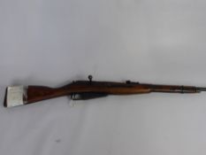 A WW2 Russian Mosin-Nagan M38 7.62 Carbine, dated 1944. Old Spec deactivated, cocks, dry fires and