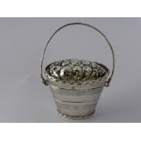 A Hallmarked Dutch Silver Marriage Box of tapering oval form. The cover chased with fruit with plain