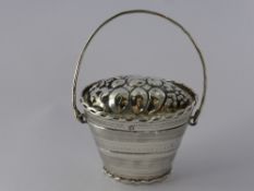 A Hallmarked Dutch Silver Marriage Box of tapering oval form. The cover chased with fruit with plain