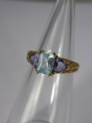 A Lady's 9ct Gold Aquamarine and Amethyst Ring, size M, approx 2.3 gms.