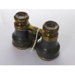 A Pair of Brass Opera Glasses, together with a pair of Dollond of London miniature binoculars in the